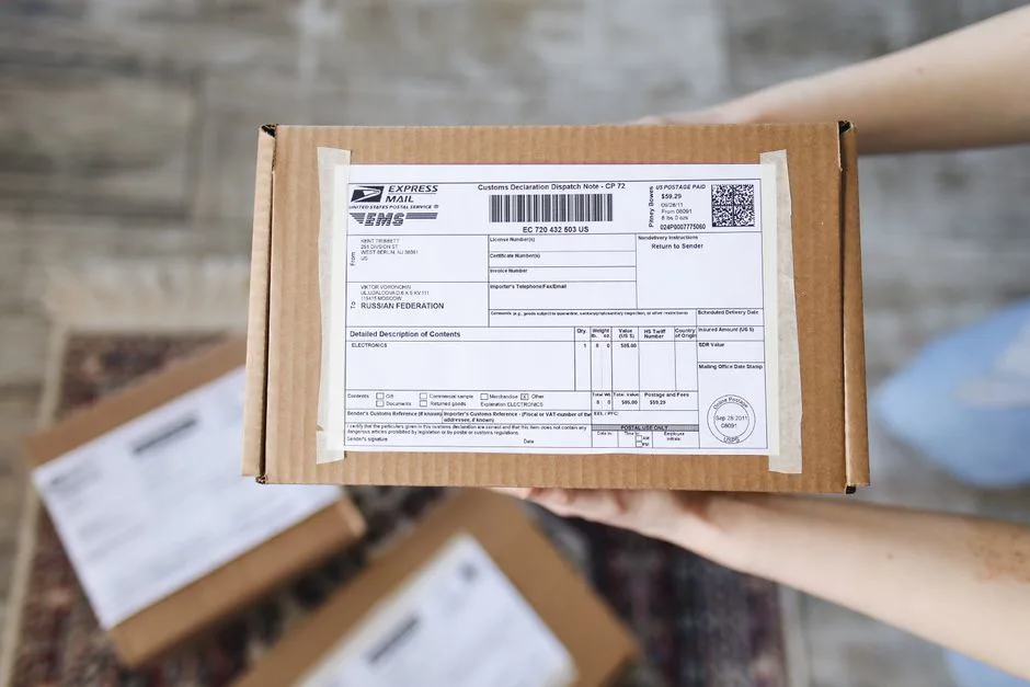 Customs documents and clipboard on desk with Mexico customs clearance stamp